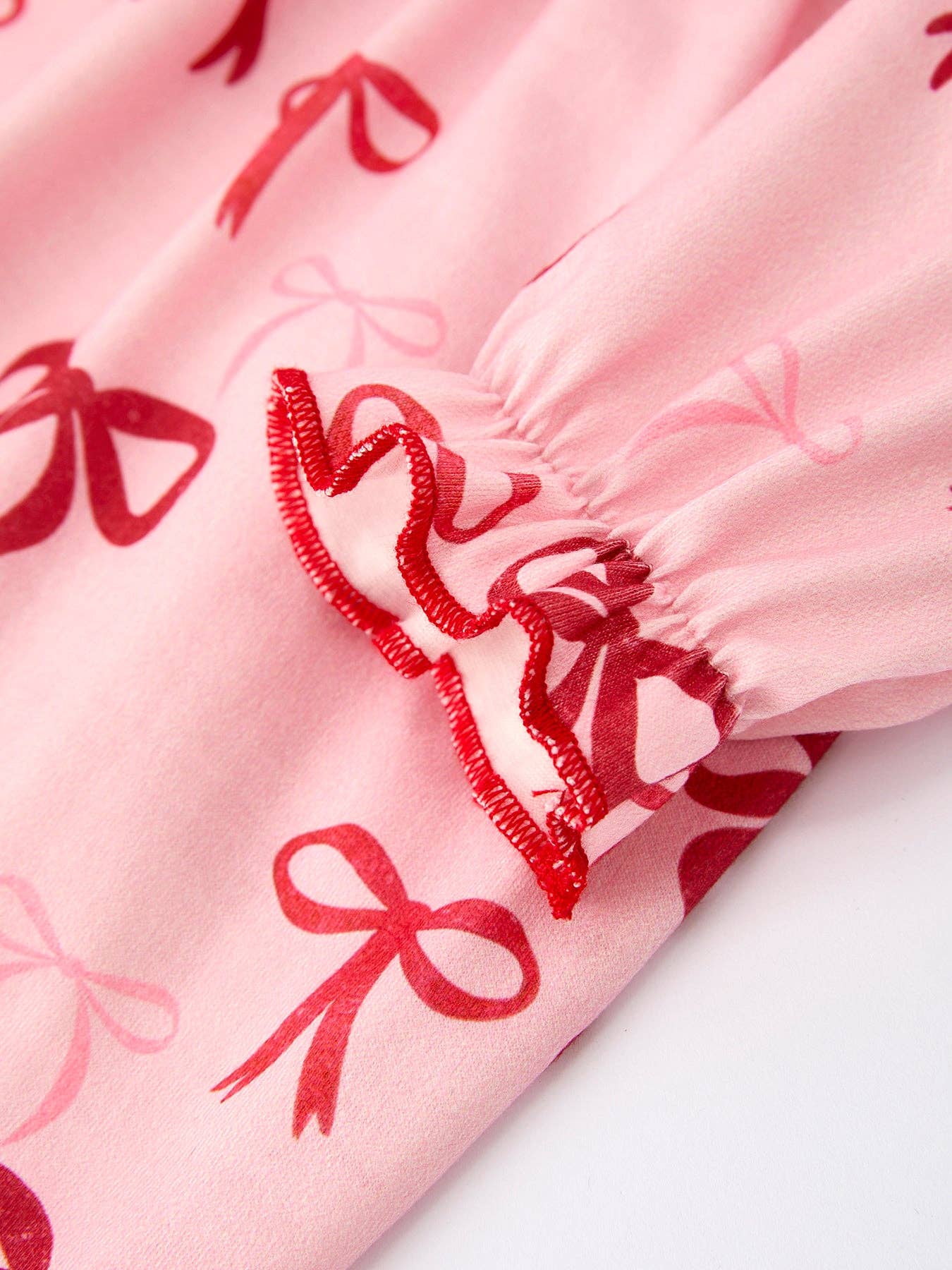 Rylee Faith Designs - Venta al por mayor Peto - Bebés - Pelele para bebé niña con estampado de lazo8