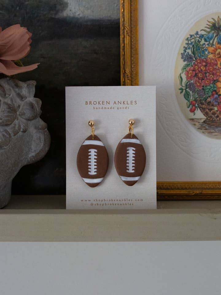 Ciondoli da calcio per la vendita all'ingrosso da parte di Broken Ankles LLC