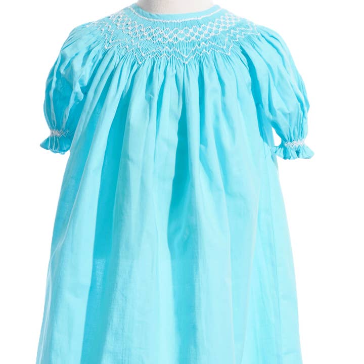 Blue Geo Smocked With Pearls Short Sleeve Bishop Dress for wholesale by Hello Bebes!