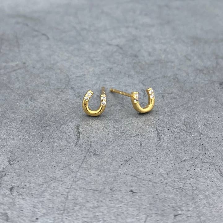 Dainty CZ Horseshoe Studs for wholesale by Something Silver