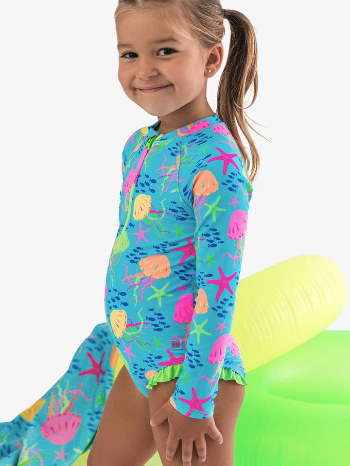 Maillot de bain une pièce à manches longues pour filles Neon Jelly Time pour la vente par RuffleButts + RuggedButts