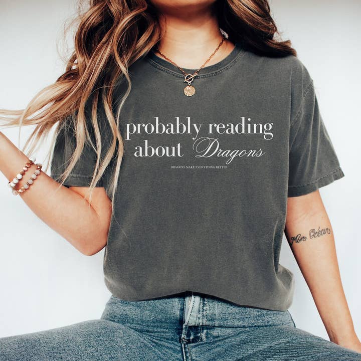 Probablement en train de lire sur les dragons T-shirt pour la vente par Parchment & Parcel