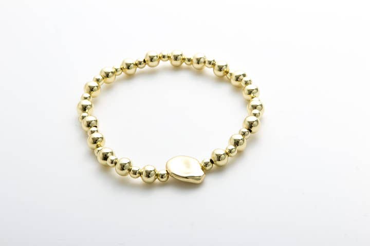 Armbånd med elastik i guld for engroshandel hos Accessoires by KHB