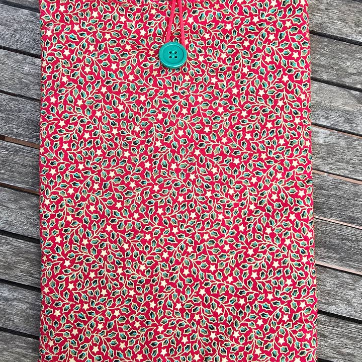 Housse de livre matelassée de Noël gui rouge pour la vente par laubelgo