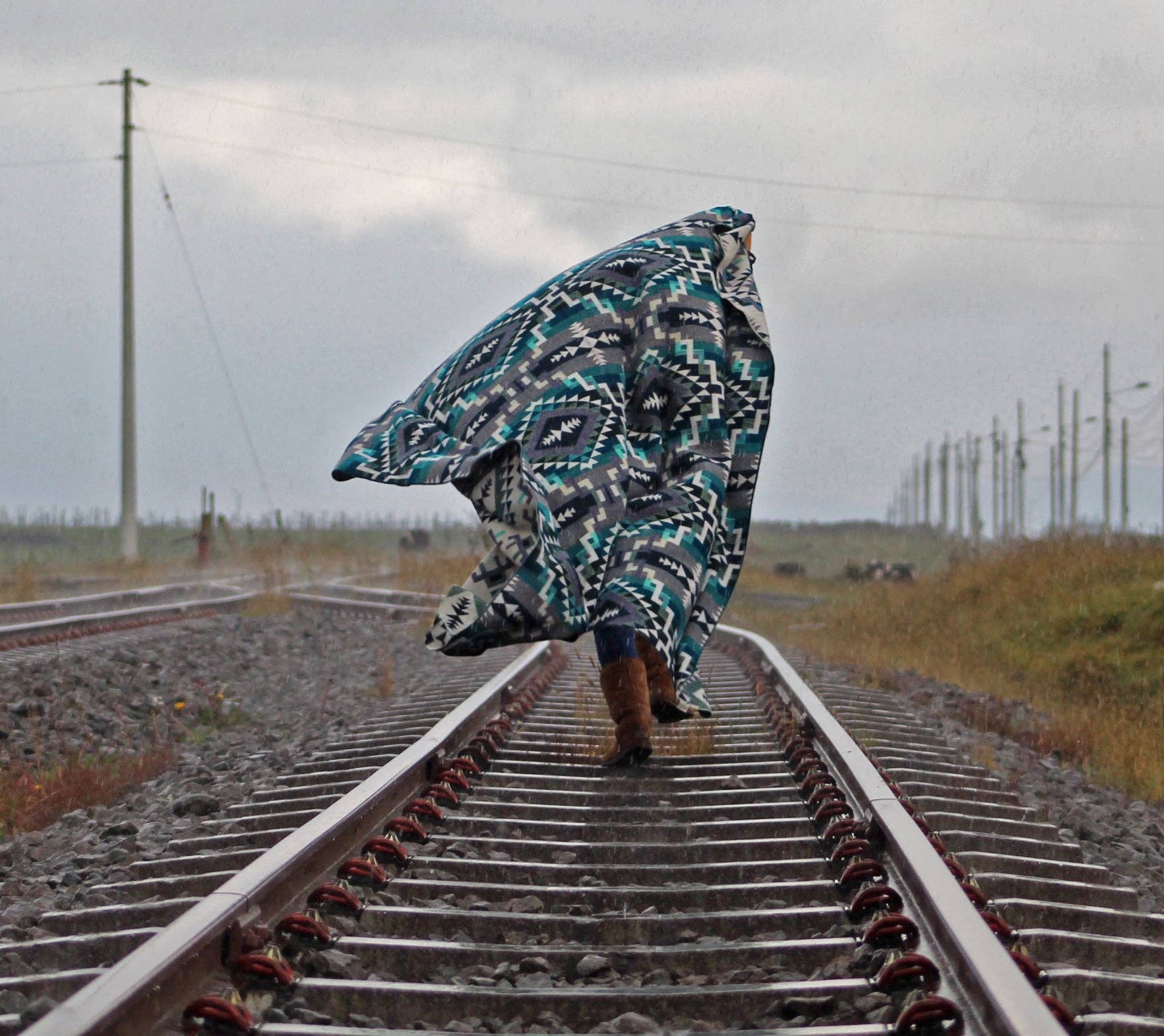 Aqua Agua de Los Andes Alpaca Blend Blanket for wholesale on Faire7