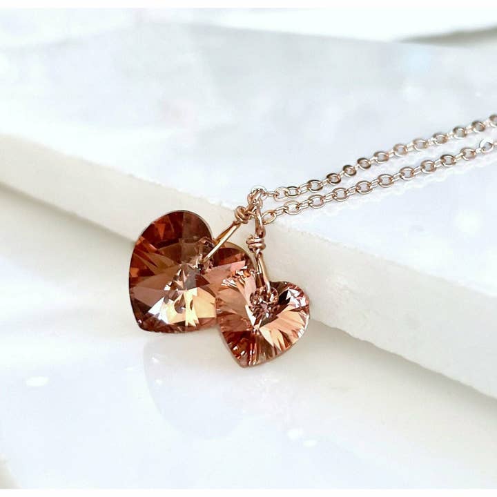 Two hearts necklace crystal necklace in rose gold for wholesale by Love Your Bling®