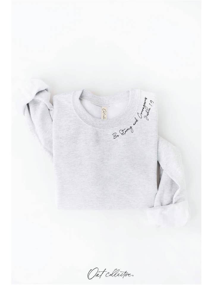 OAT COLLECTIVE - Wholesale Graphic Sweatshirt - Women's - BE STRONG AND COURAGEOUS Graphic Sweatshirt