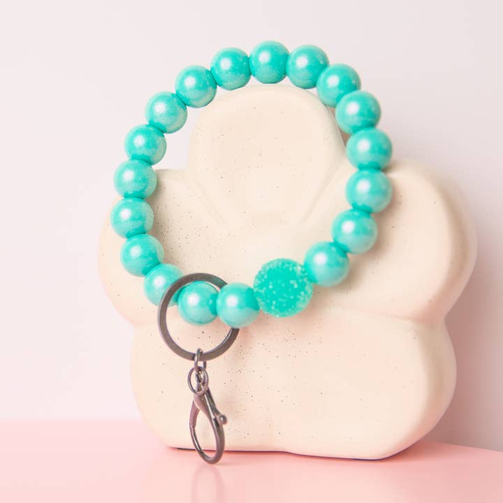 Neon Teal Wristlet for wholesale by Darling Doe Designs