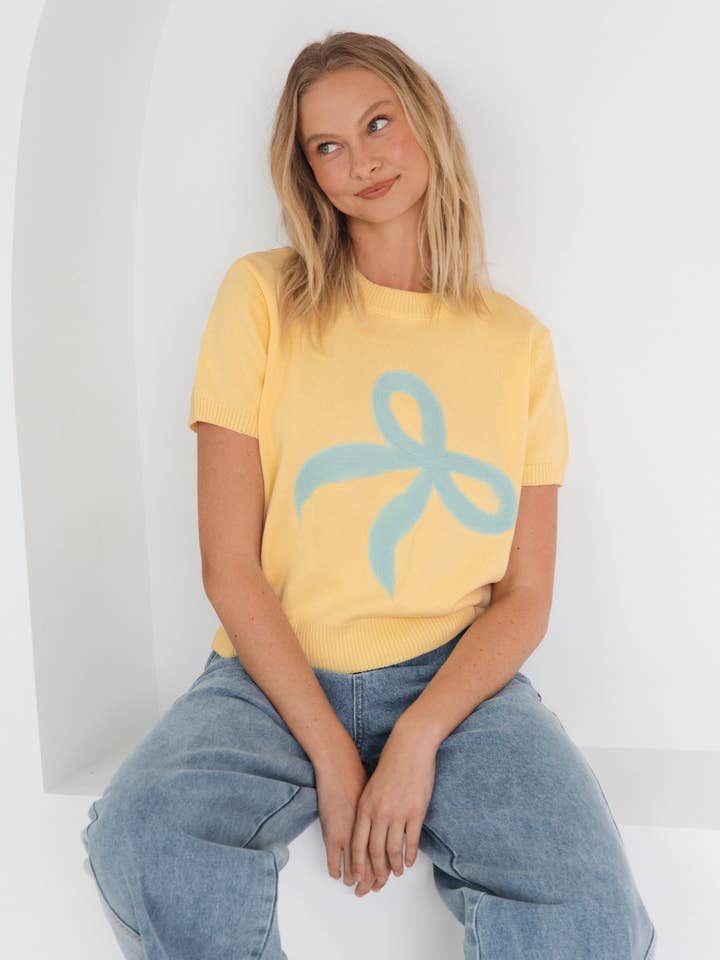 LARA BOW KNIT TEE for wholesale by Global Fashion House