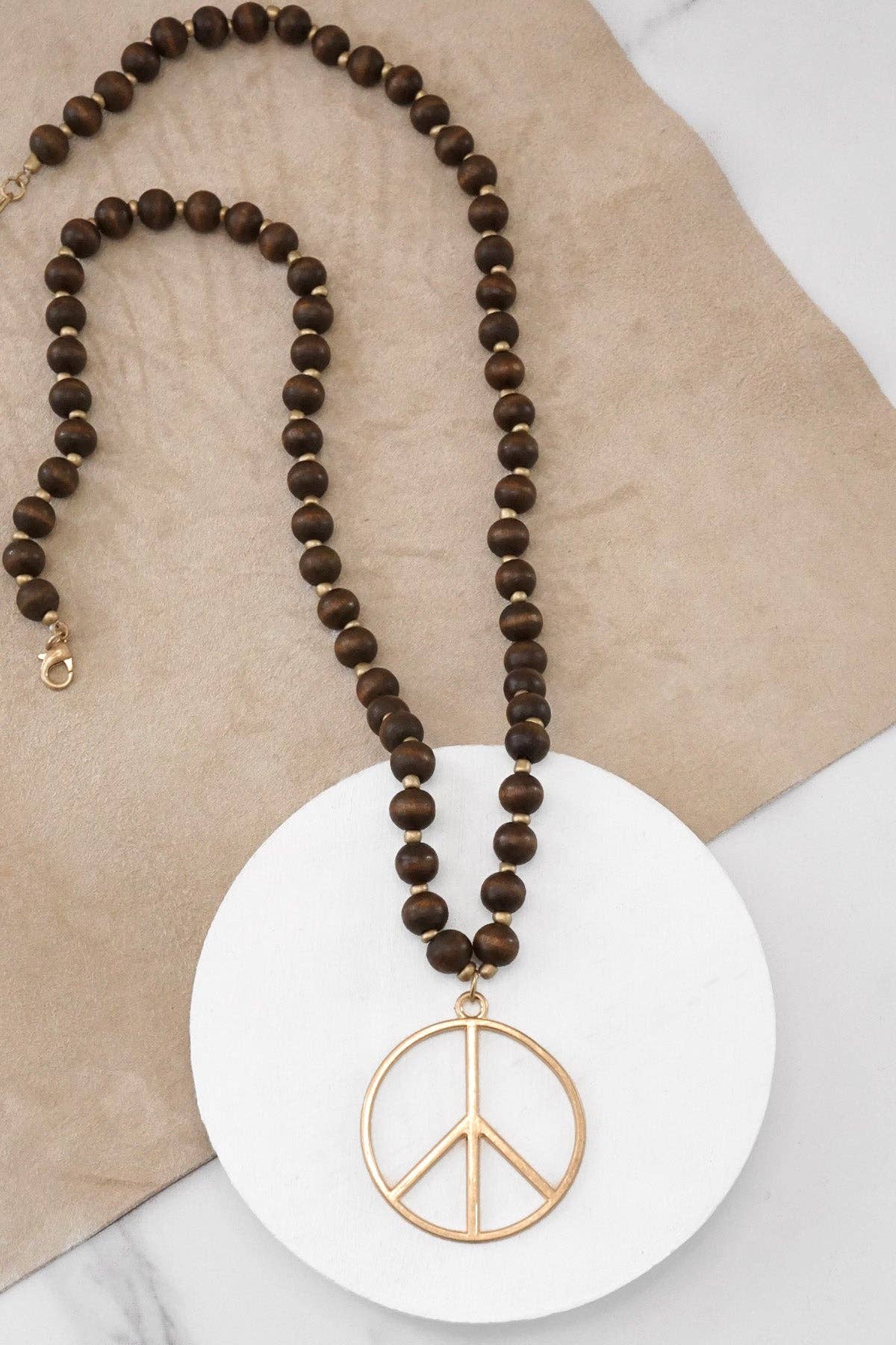 PennyLine inc - Wholesale Pendant/Charm Necklace - Long Wood Bead Necklace with golden peace sign pendant - Brown0