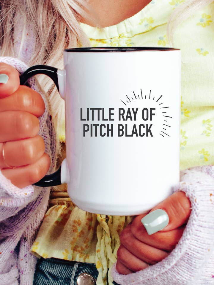 Little Ray of Pitch Black {RAYS} 15oz Coffee Mug for wholesale by Blonde Ambition Apparel & Designs