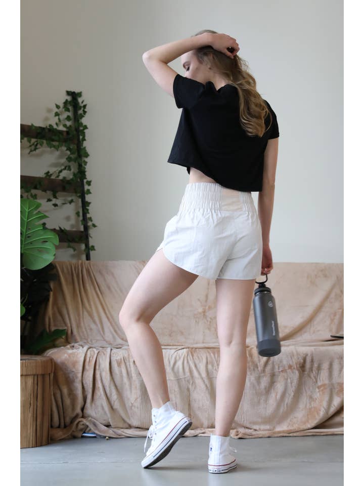 BONE .....SI-22112 Smocked waist track shorts w/ mesh pocket & lining for wholesale on Faire