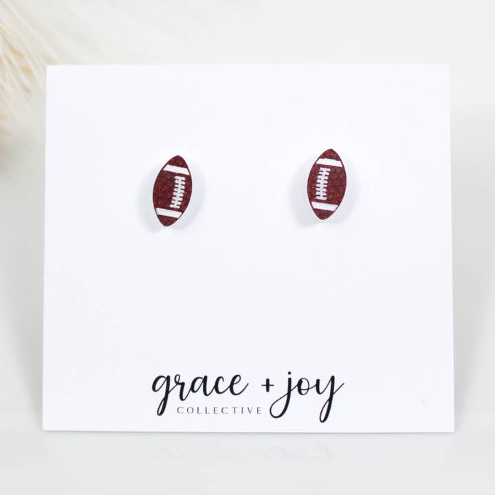 Boucle d'oreille Football Stud, Boucles d'oreilles en acrylique pour la vente par Grace + Joy Collective