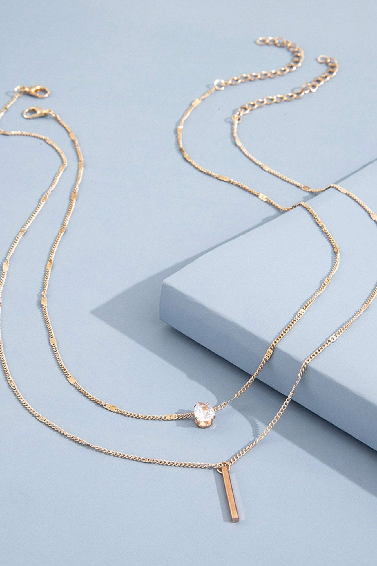 WoodWristCo - Wholesale Halskettinghanger - Gestapelde ketting met rhinestone kwastje en hanger1