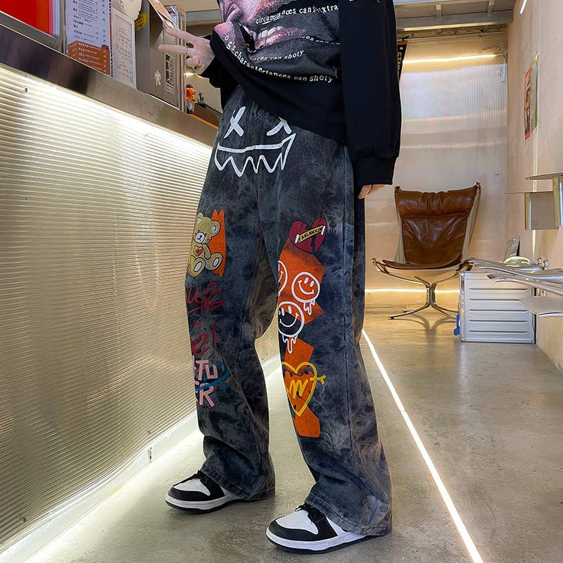 Nero Jeans graffiti hip-hop neri larghi e dritti unisex in vendita all'ingrosso su Faire1