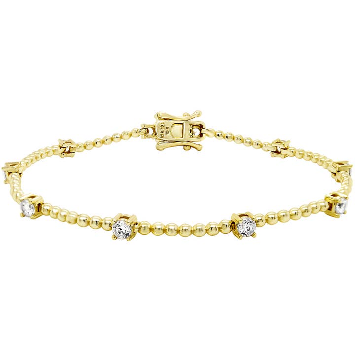 Bracelet en argent sterling plaqué or avec boules et zircone cubique blanche pour la vente par Dlux Jewels