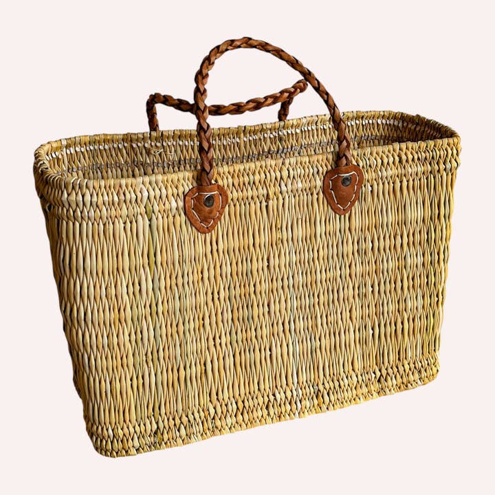 Handmade Woven Reed Basket with Thin Leather Handles for wholesale by HandHappiness