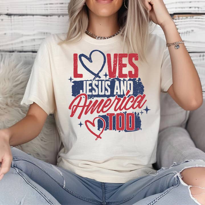 LOVES JESUS & AMERICA TOO - GRAPHIC - TSHIRT for wholesale by MdB Designs