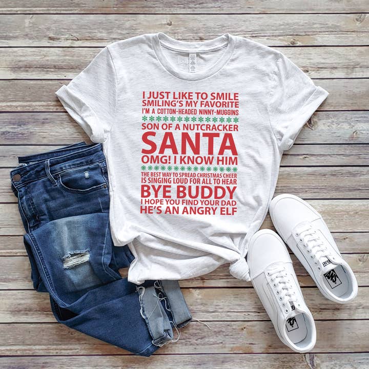 CAMISETA CON FRASES DE PELÍCULAS NAVIDEÑAS | ELFO | NAVIDAD | TALLAS XS-2XL para venta al por mayor de Loopty Loo Designs