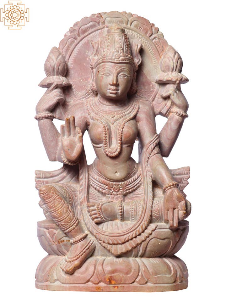 Statue de la déesse Lakshmi de 20 cm assise sur un piédestal | Statue en pierre rose pour la vente par Exotic India Art