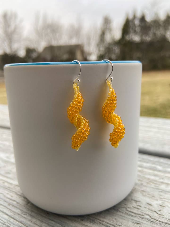 Orange and Yellow Swirl Earrings for wholesale by DlpDesigned