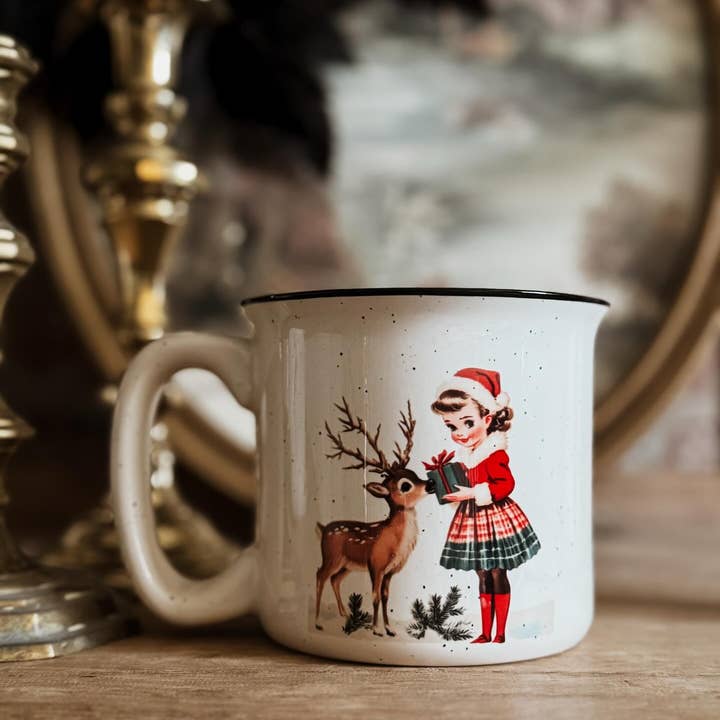 VINTAGE CHRISTMAS GIRL WITH DEER CAMPFIRE MUG for wholesale by Haverly and Co.