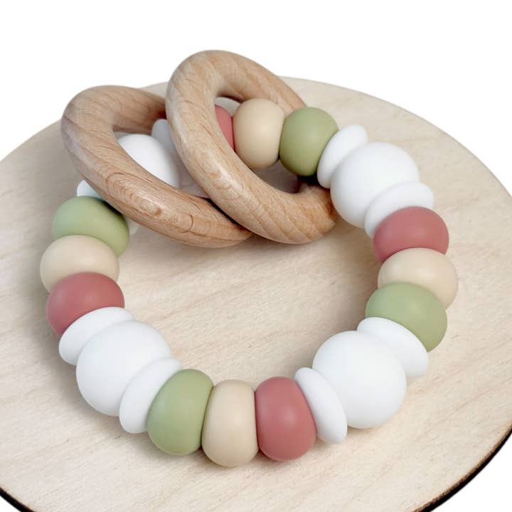 Rose Rattle for wholesale by Kaity Kiddo