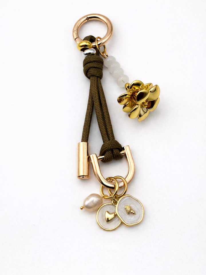 Leo Charm – Bag & Accessory Charm (Olive Green, Plumeria) for wholesale by Leo & Lei