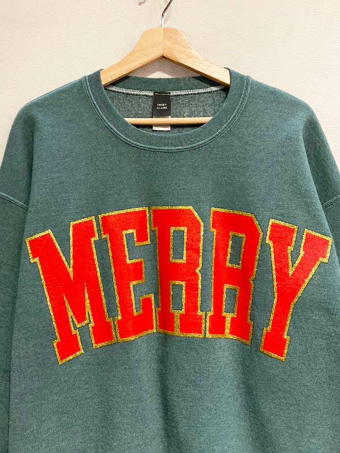 Best Selling Glitter Merry Holiday Sweatshirt for wholesale by Sweet Claire