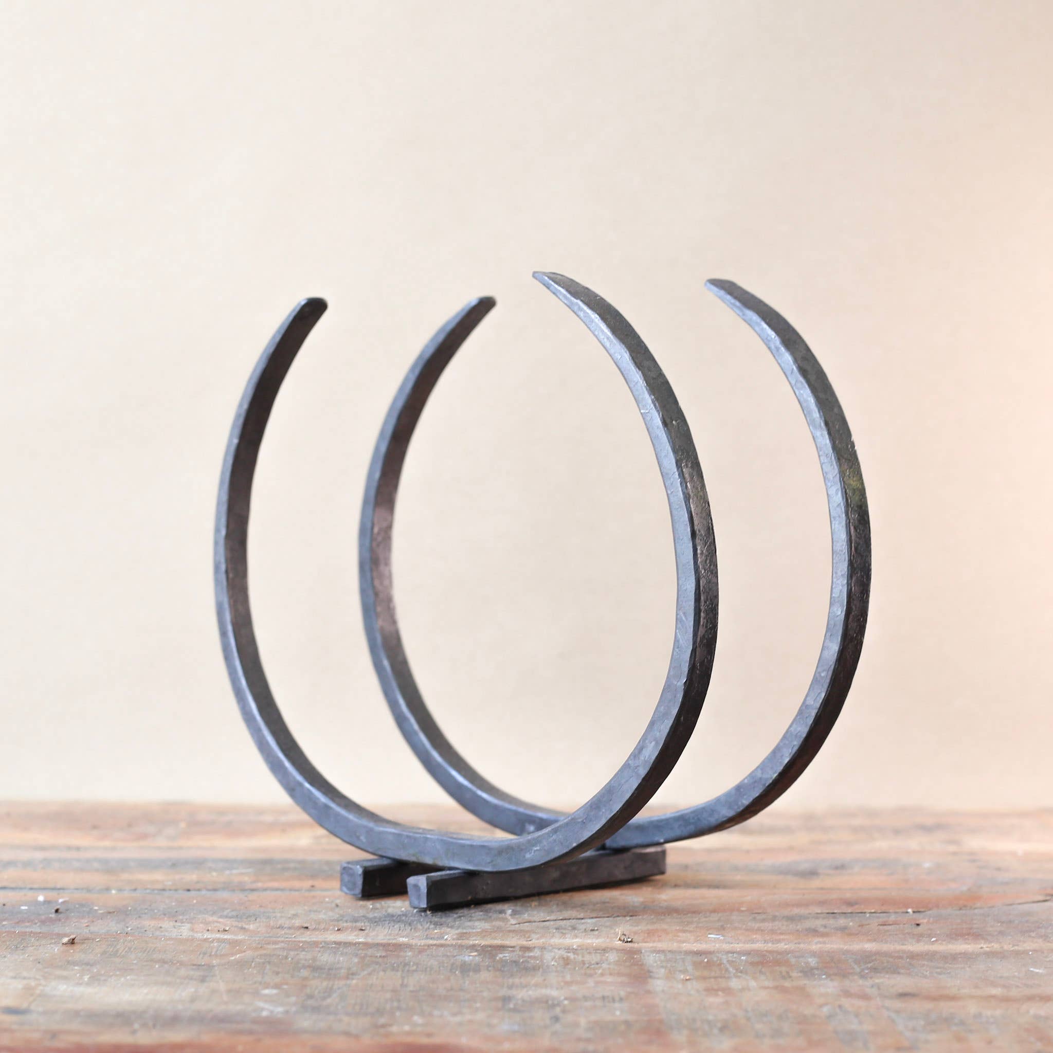 Coach House Forge – wholesale Fireplace mantel – Hand Forged Iron 'Long Horn' Log Storage. 5