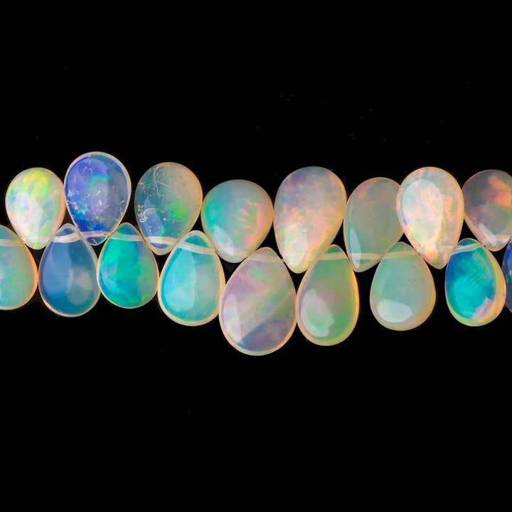 9x6—12 x 9 mm Perlen aus äthiopischem Opal, schlichte Birnenperlen, 7,5 Zoll, 75 Stück für den Großhandel von Beads of Cambay