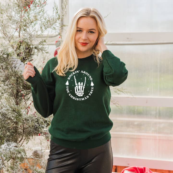 Rockin' Christmas Skeleton Sweatshirt for wholesale by Soph & Lil Design