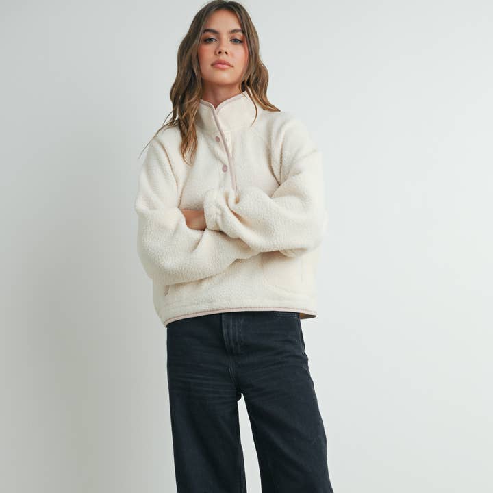 FLEECE BUTTON FRONT SIDE POCKET LONG SLEEVE TOP - BMT7152 and other Purchase Wholesale how's. Free Returns & Net 60 Terms on Faire trending on Faire.