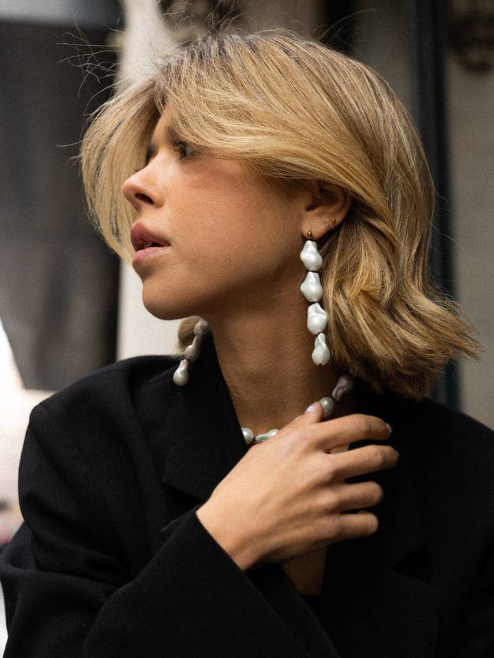 Gli orecchini barocchi per la vendita all'ingrosso da parte di Alice & co