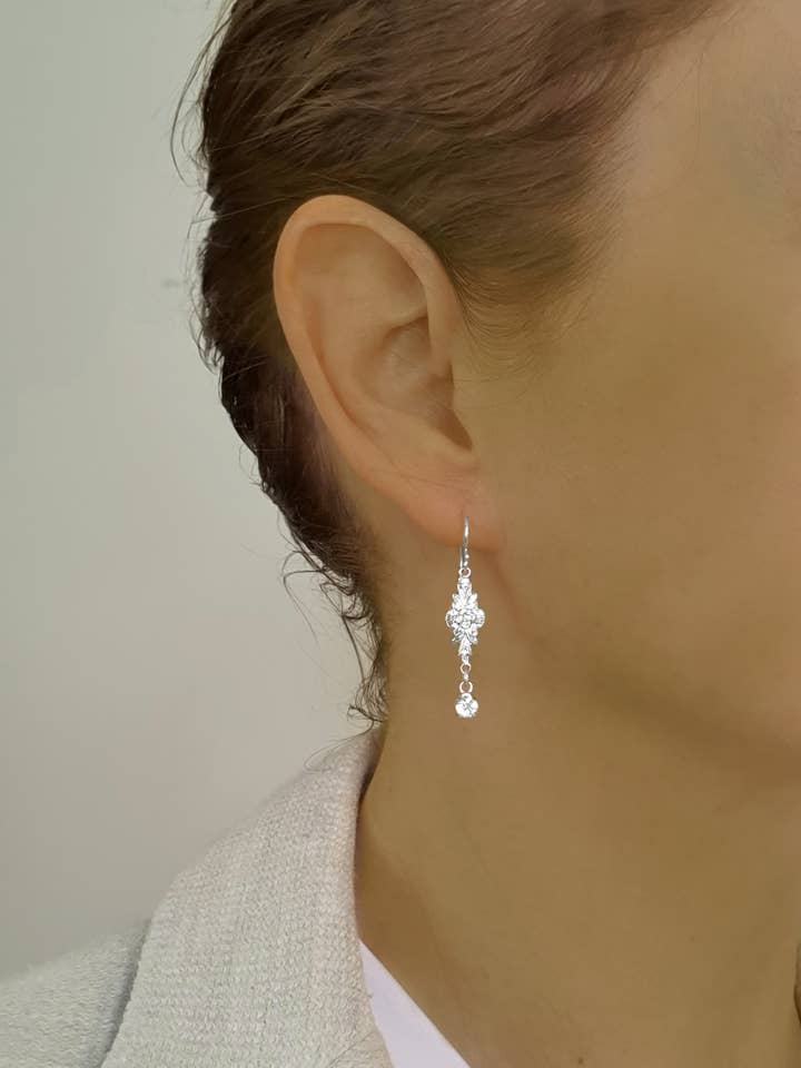 Rhodium plated link earrings with Austrian Zirconia for wholesale by DIGE DESIGNS