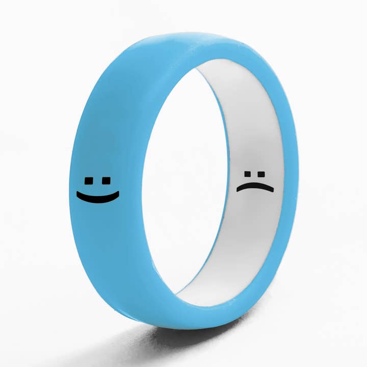 Bague réversible sourire et sourcils Flip Bleu fluo pour la vente par Flip Rings