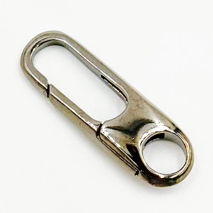 1355BRS. 20MM Svart Rodium Glänsande Ovalt Lås i Sterlingsilver för wholesale av Jewels & Chains