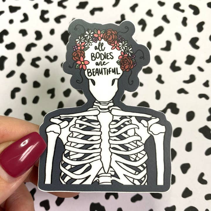 All Bodies Are Beautiful Floral Skull Vinyl Sticker for wholesale by Michaela Shailene LLC