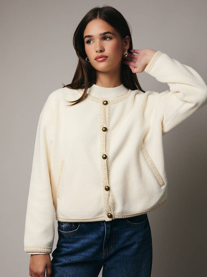CREAM ROUND NECK BUTTON DOWN FLEECE CARDIGAN for wholesale on Faire0