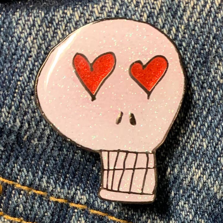 GLITTER Heart Eyes Skull Enamel Pin for wholesale by Georgia Made This