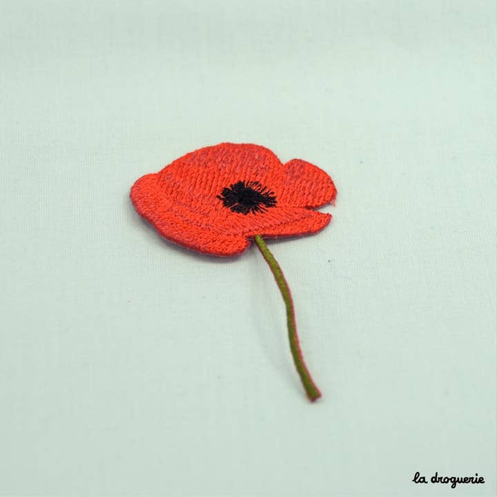 LA DROGUERIE – wholesale Lapp – Vapenmärke "Vallmoblomma"1