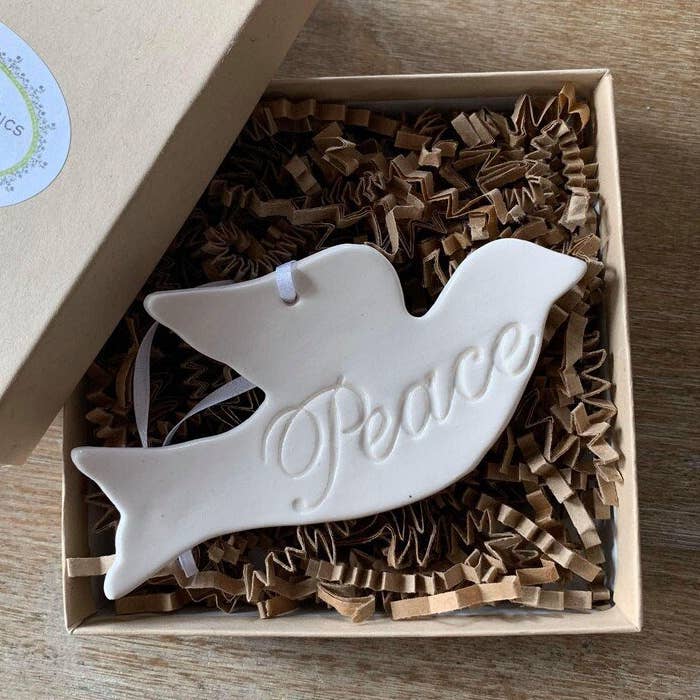 Peace Dove Ceramic Christmas Ornament | Handmade Pottery for wholesale by Chrissy Ann Ceramics