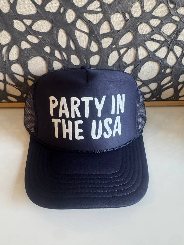 Fest i USA - Marineblå Trucker for engroshandel hos Arnie + Ollie