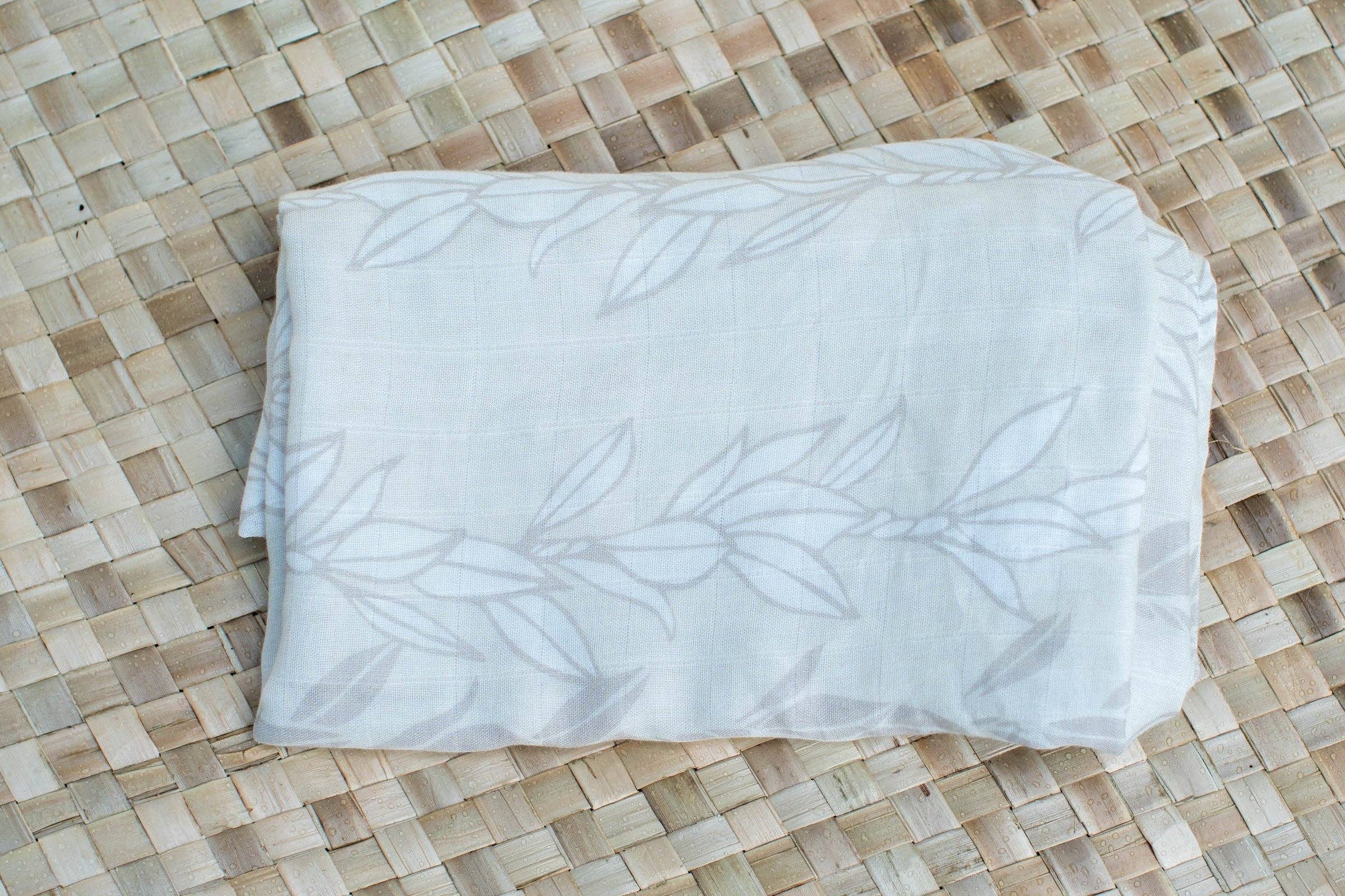 The Keiki Dept - Wholesale Swaddle - Baby - White Maile Strands Kapa Moe - Hawaiian Bamboo Swaddle8