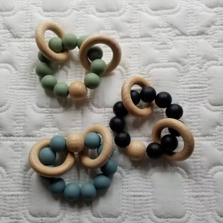 Silicone Beech Wood Bracelet Rattle Teether for wholesale by D & C TOYS