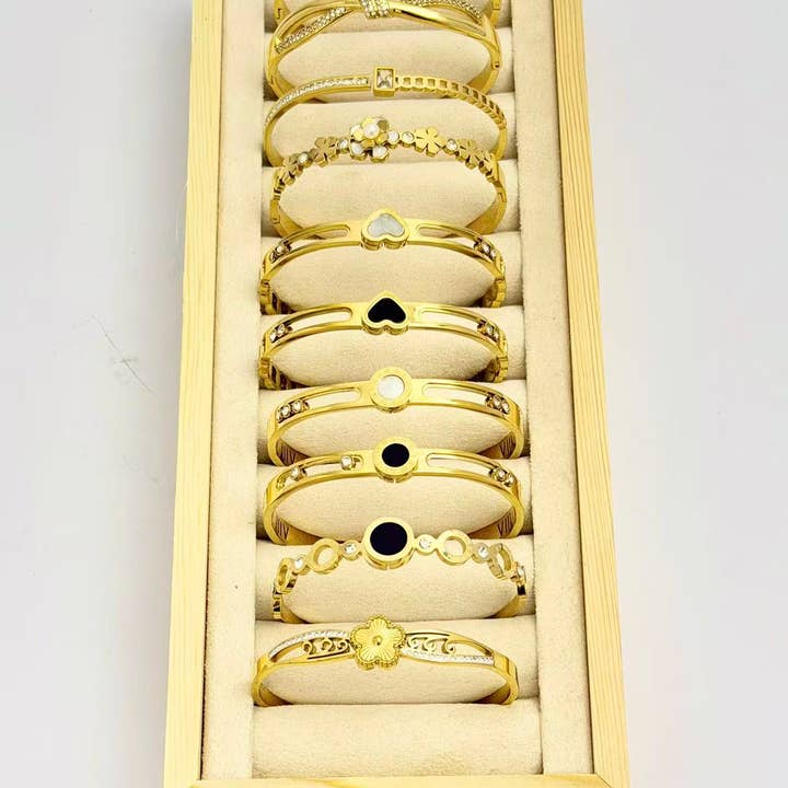 COSMOS - Wholesale Jewelry Set - Set of 10 elegant stainless steel bracelets on display1