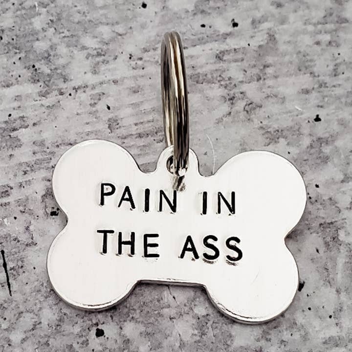 PAIN IN THE ASS Bone-Shaped Pet Tag for wholesale by Salt and Sparkle