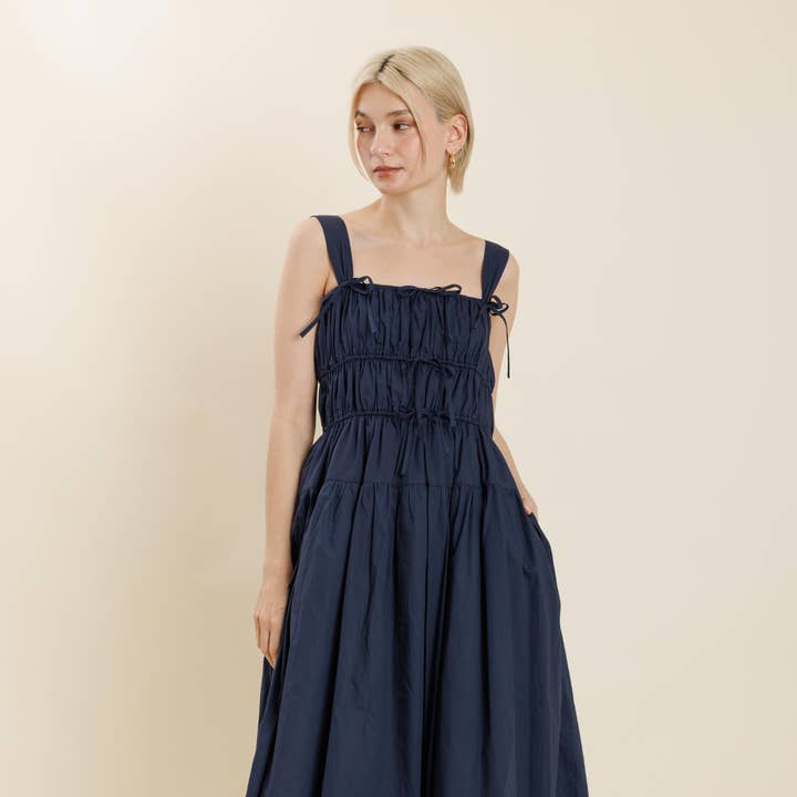 AD2261 - MIDI DRESS W/ BOWS and other Purchase Wholesale cotton poplin fabric. Free Returns & Net 60 Terms on Faire trending on Faire.