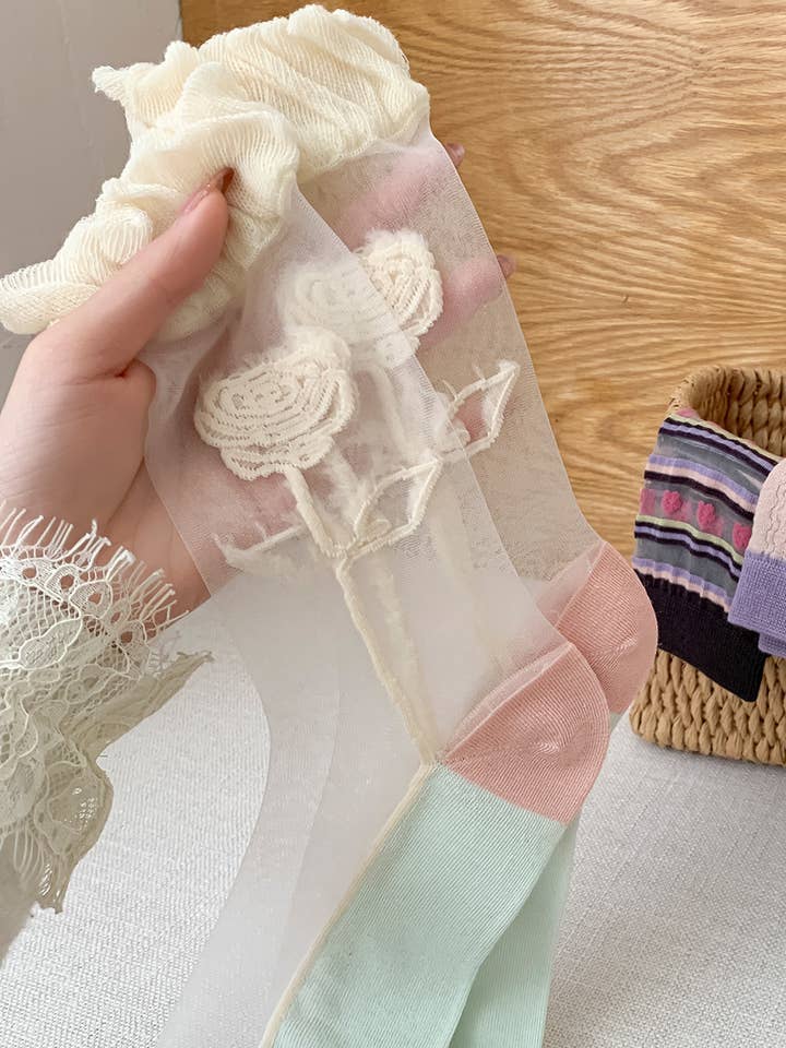 Sheer socks with embroidered rose 🌹✨ for wholesale on Faire2