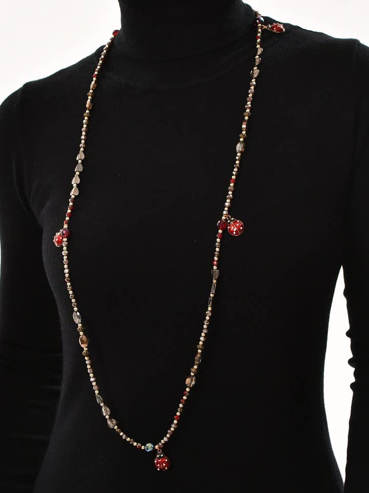 Long crystal beaded necklace with ladybugs for wholesale by Victoria Moda